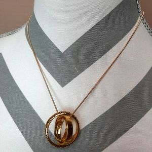 Gold tone globe Necklace/ring